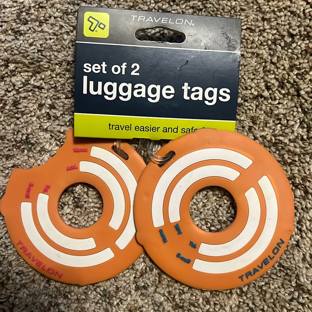 New tags.  Travel On Set Of 2 Donut Shaped
Luggage Tags
Brand New w/ Tags